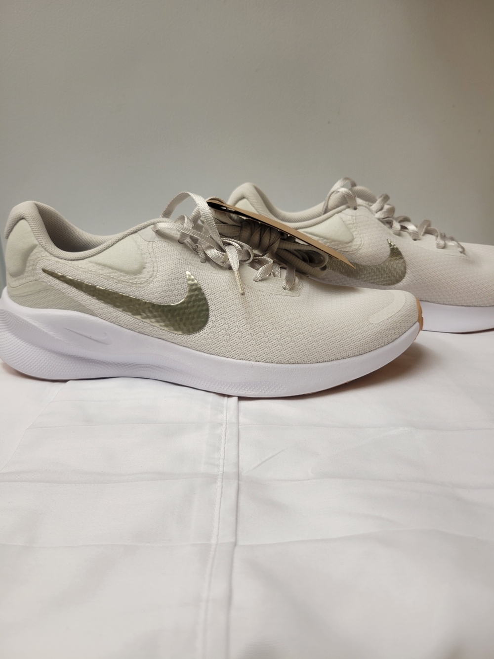 Nike Neutral/Tan Running Shoes with Metallic Swoosh
